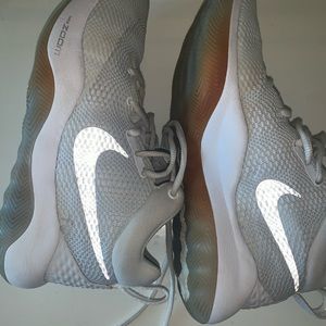 White on White Nike Rev Zoom basketball shoes